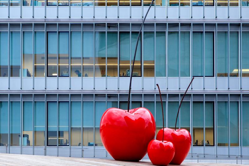 giant red cherry sculptures